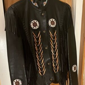 A work of art. Restored hand-beading by name.
Jacket M, Color Blk